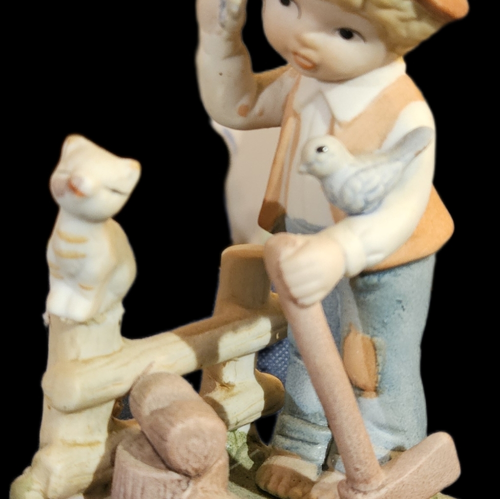 Charming Vintage Figurine Boy Chopping Wood with Cat and Bird